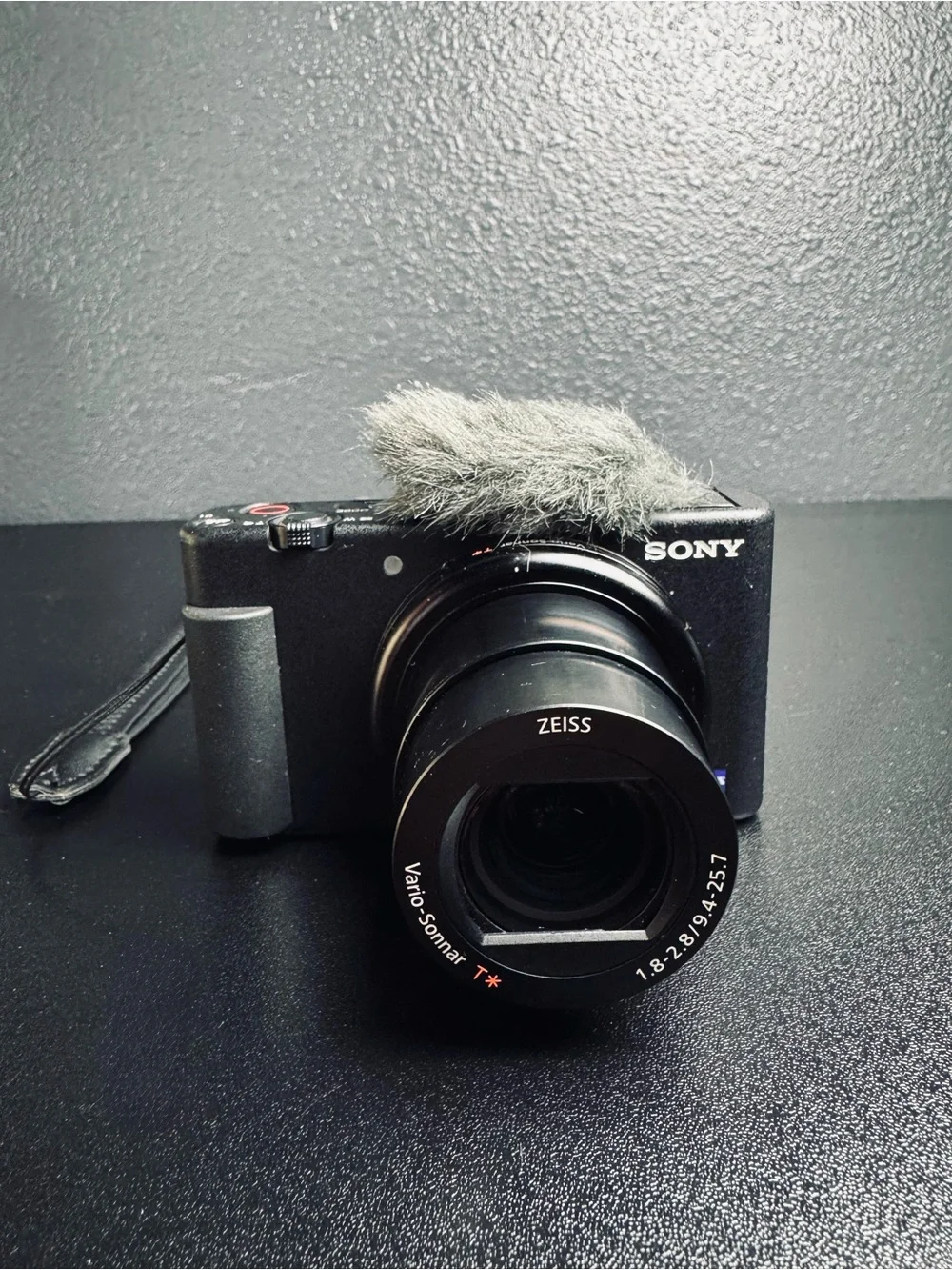 Sony Black Compact Digital Camera with Zeiss Lens and Wind Muff